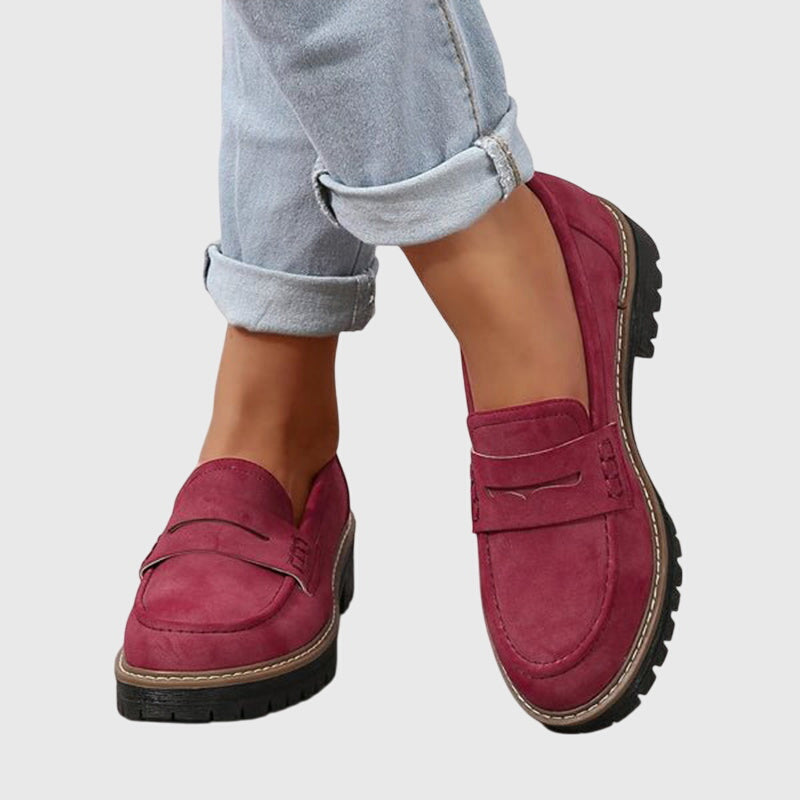 Women's penny loafers with round toes and low lug soles