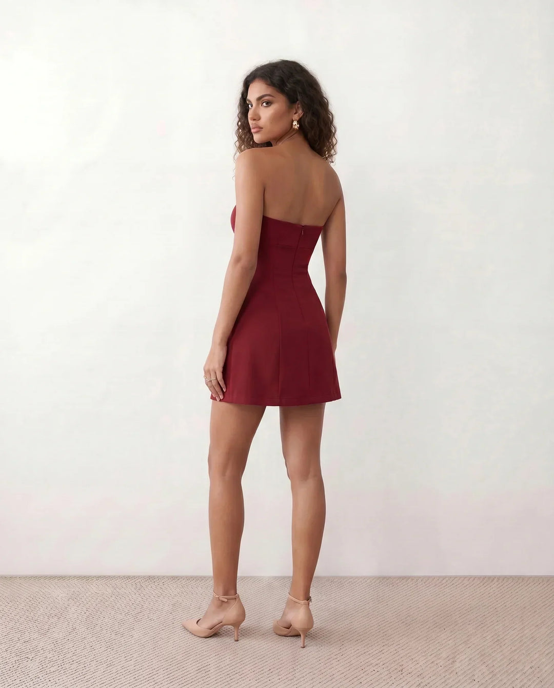 Women's strapless pleated mini dress with straight neckline