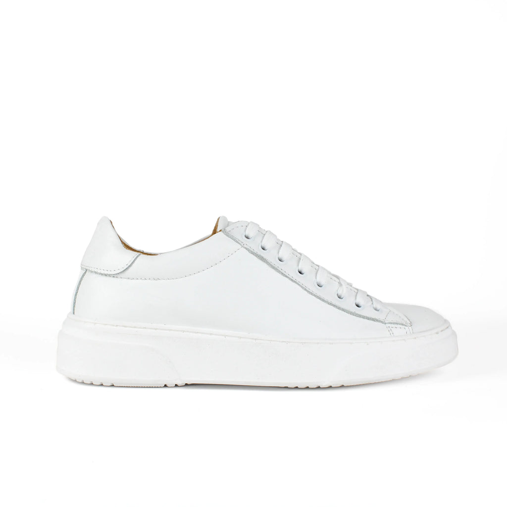 White low-top leather sneakers with laces and thick flat soles