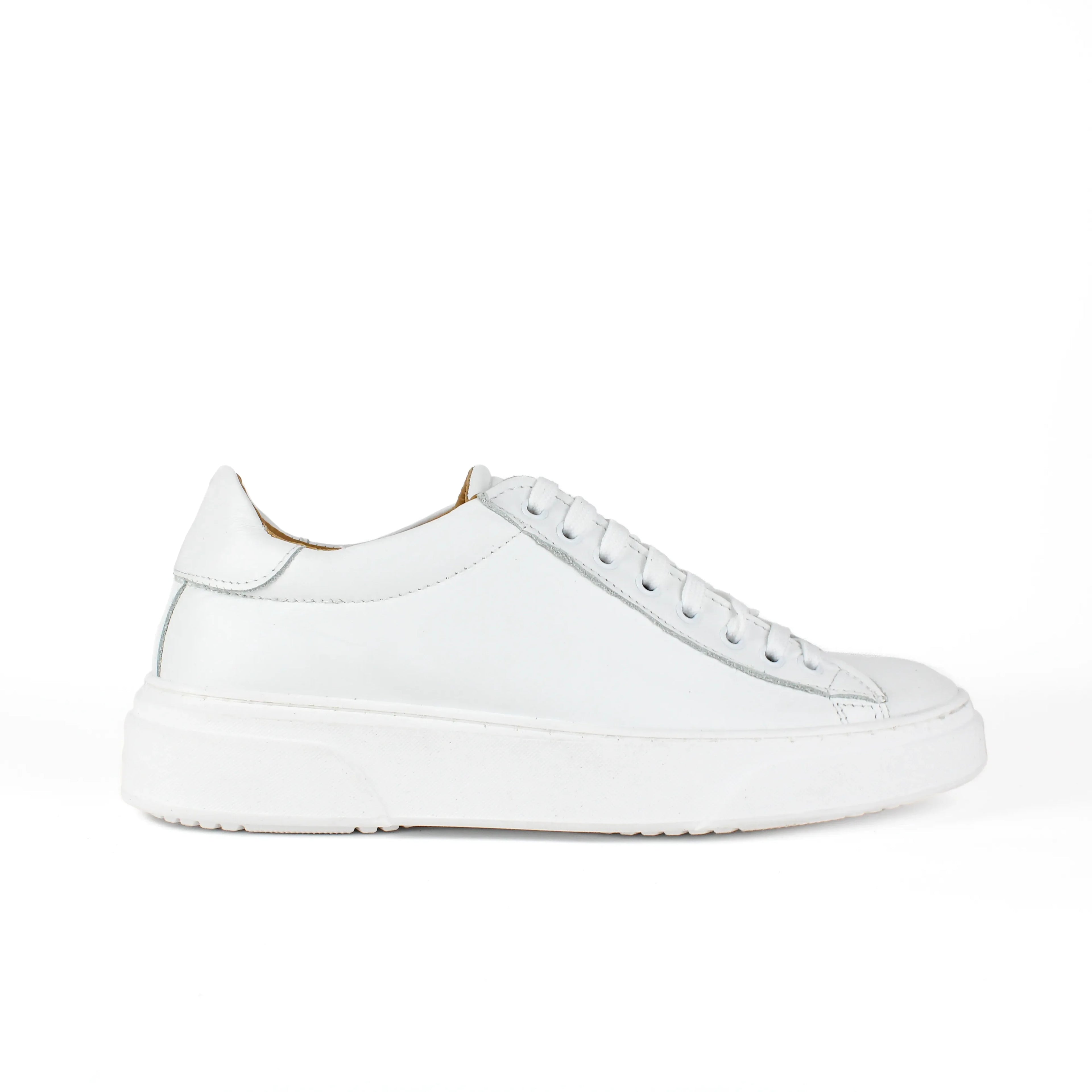 White low-top leather sneakers with laces and thick flat soles