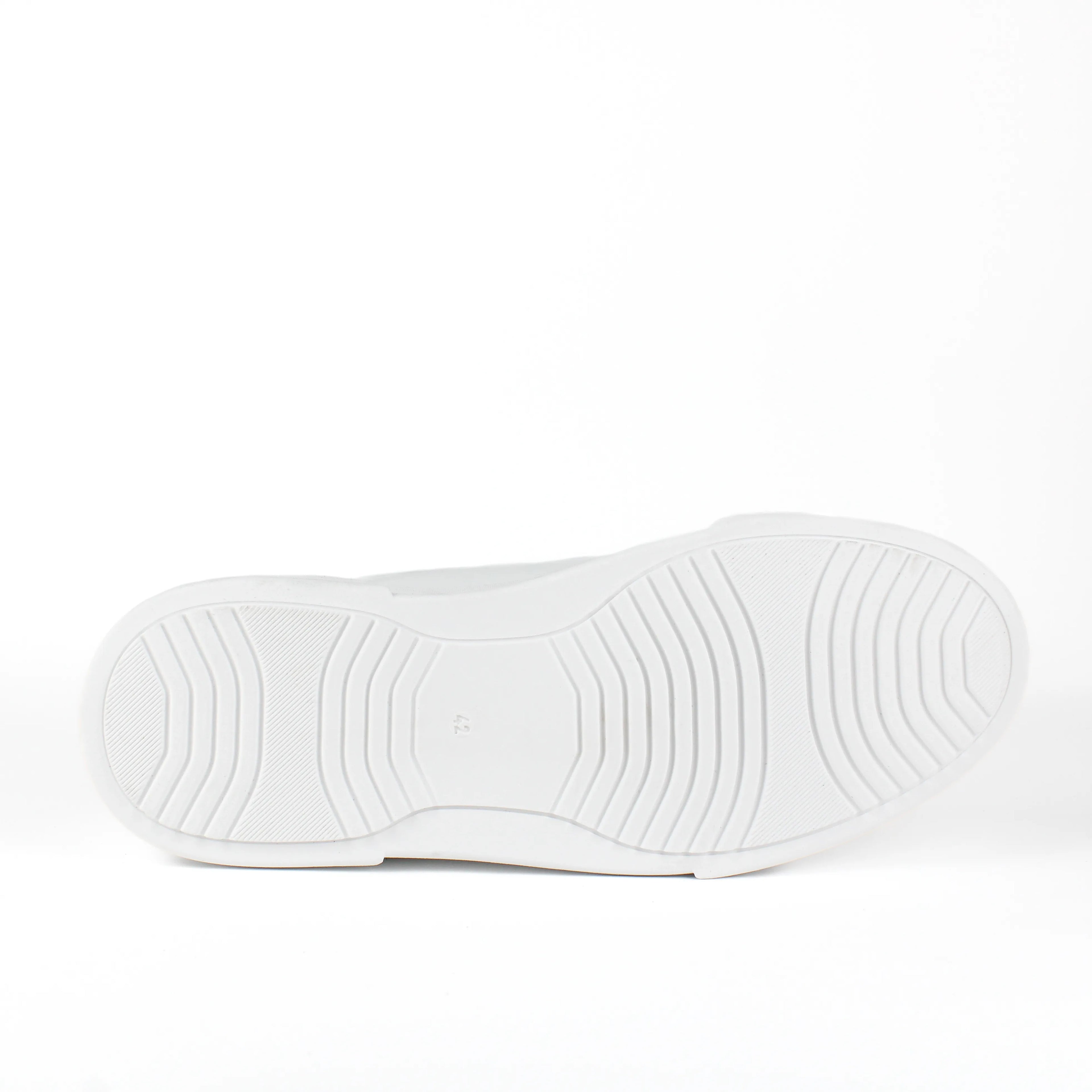 White low-top leather sneakers with laces and thick flat soles