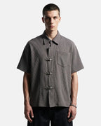 Men's dark gray waffle shirt with short sleeves and metal clasps