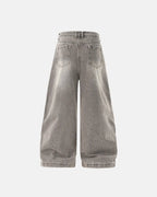 Light gray washed wide-leg jeans with rhinestone lower-leg detail