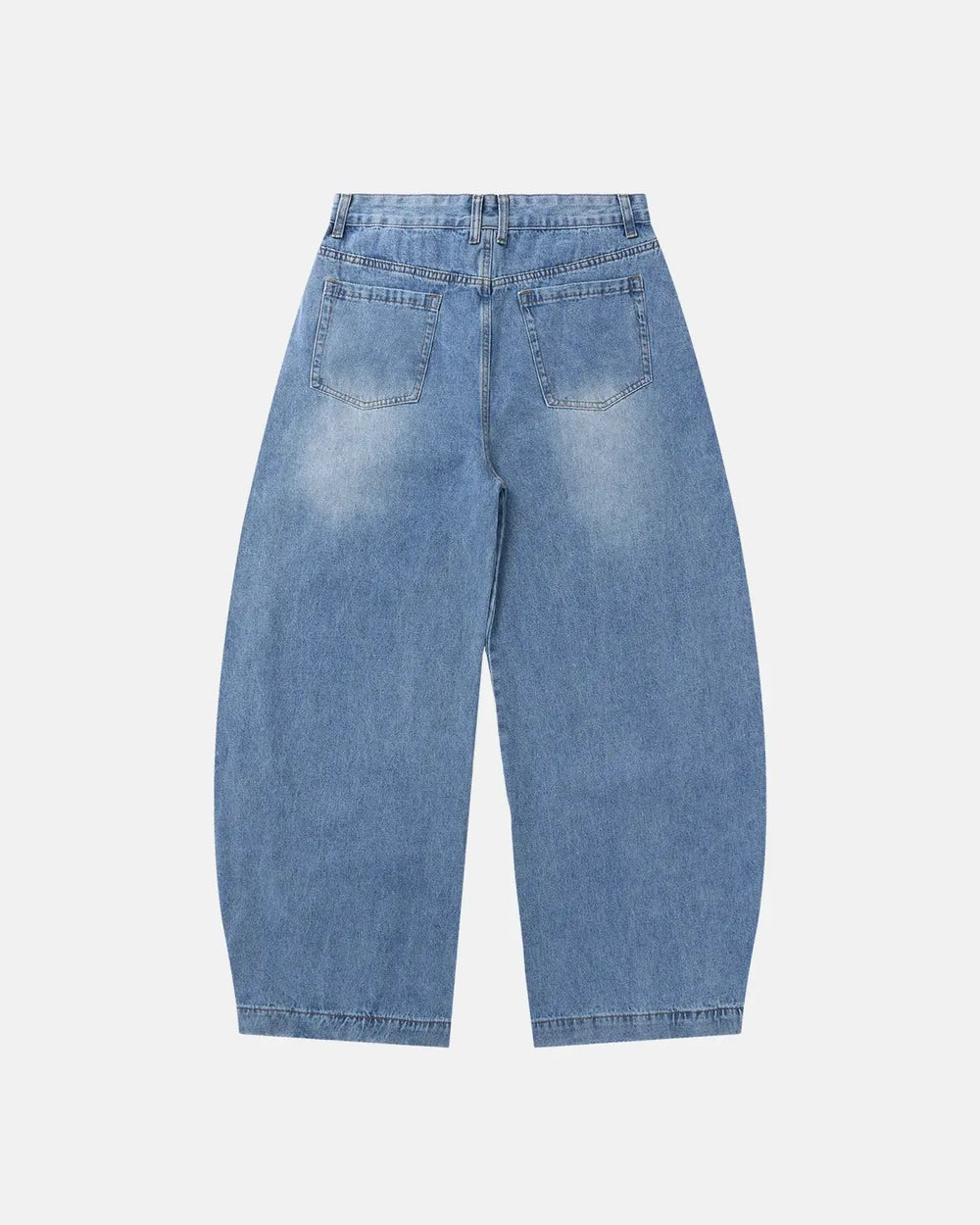 Light blue barrel jeans with script graphic on the left leg