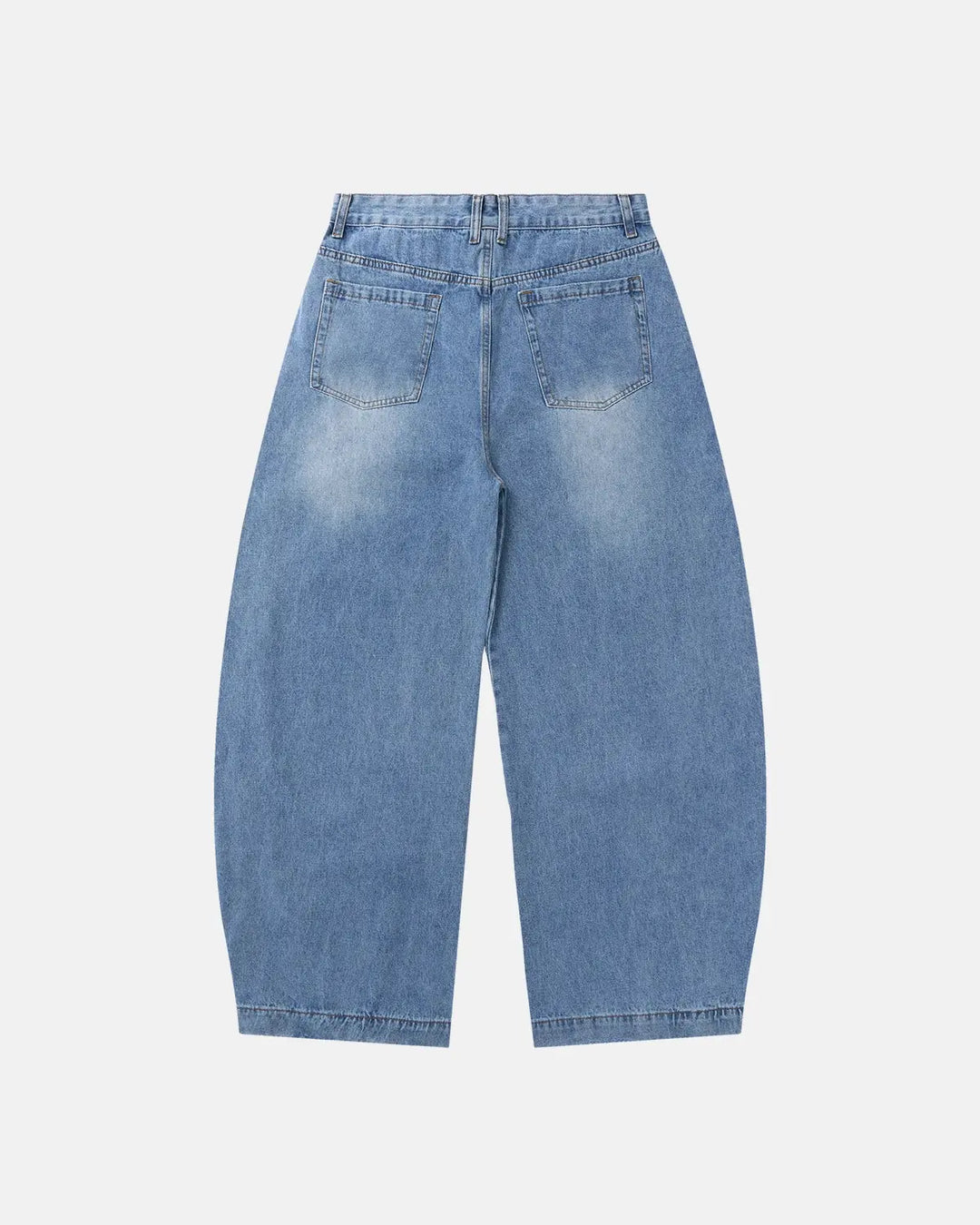 Light blue barrel jeans with script graphic on the left leg