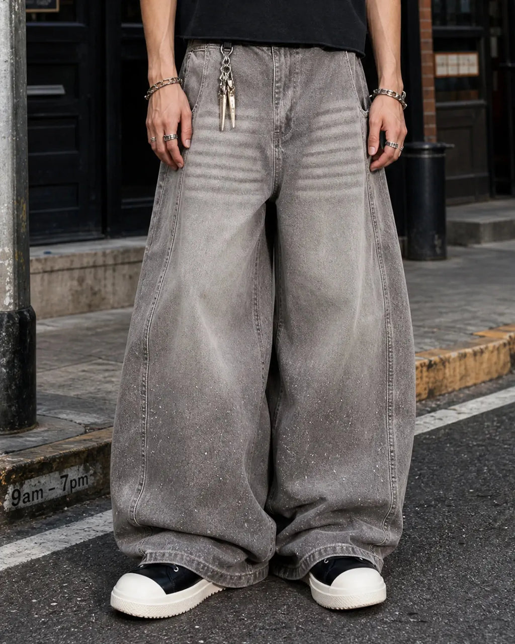 Light gray washed wide-leg jeans with rhinestone lower-leg detail