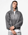 Men's grey acid-wash zip-up hoodie with hood, graphic print and front pockets