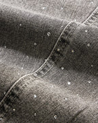 Light gray washed wide-leg jeans with rhinestone lower-leg detail
