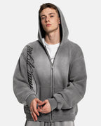 Men's grey acid-wash zip-up hoodie with hood, graphic print and front pockets