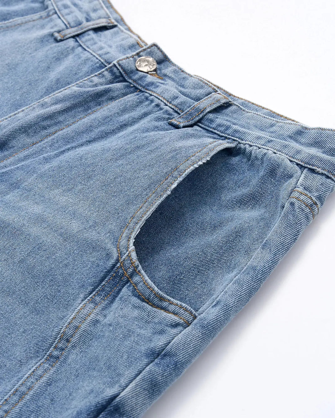 Light blue barrel jeans with script graphic on the left leg