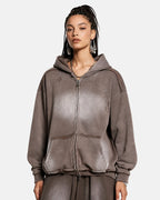 Washed zip-up hoodie with hood, pockets and distressed details
