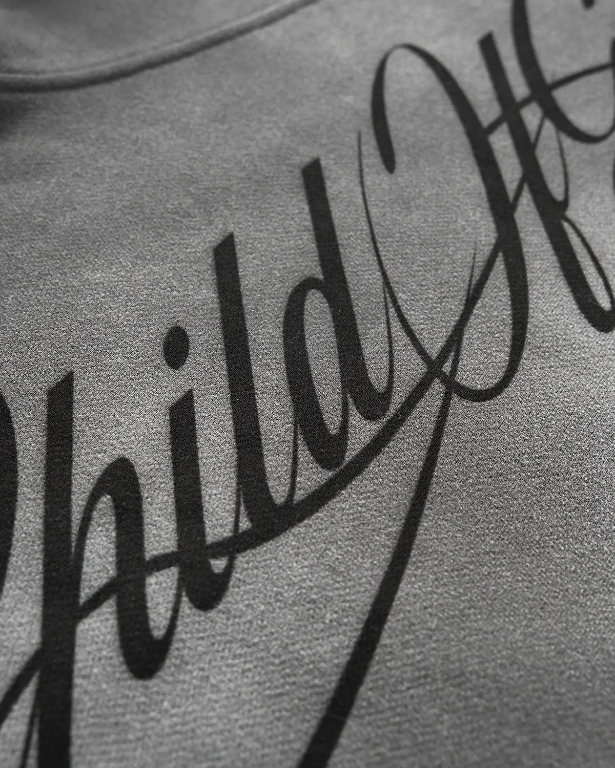 Men's grey acid-wash zip-up hoodie with hood, graphic print and front pockets