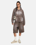 Washed zip-up hoodie with hood, pockets and distressed details