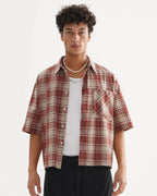 Unisex boxy plaid shirt with short sleeves and chest pocket