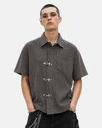Men's dark gray waffle shirt with short sleeves and metal clasps