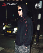 High-neck hooded pullover with long sleeves and contrast seam detailing