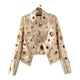 Women's cropped jacket with circular metallic eyelet detailing and long sleeves