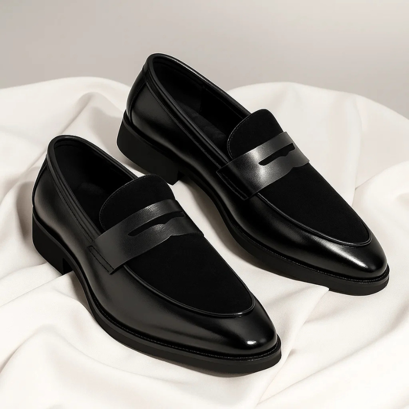 Men's navy and black penny loafers with almond toe and low heel