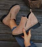Women's ankle boots with side zips, rounded toes and chunky lug soles