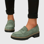 Women's penny loafers with round toes and low lug soles