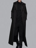 Men's black extra long double-breasted trench coat with notched lapels and epaulettes