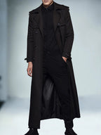 Men's black extra long double-breasted trench coat with notched lapels and epaulettes