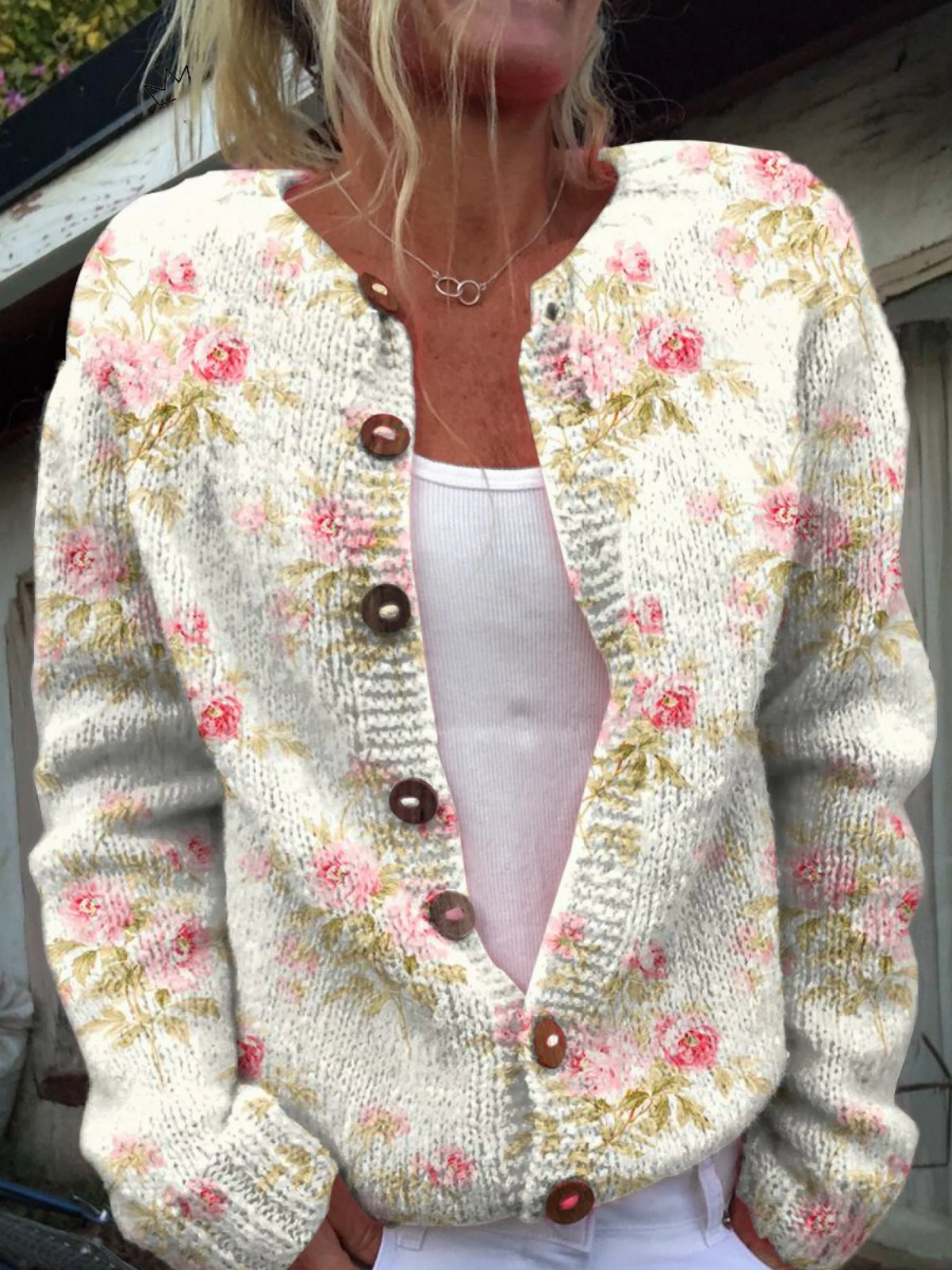 Women's floral knit cardigan with round neck, long sleeves and button front
