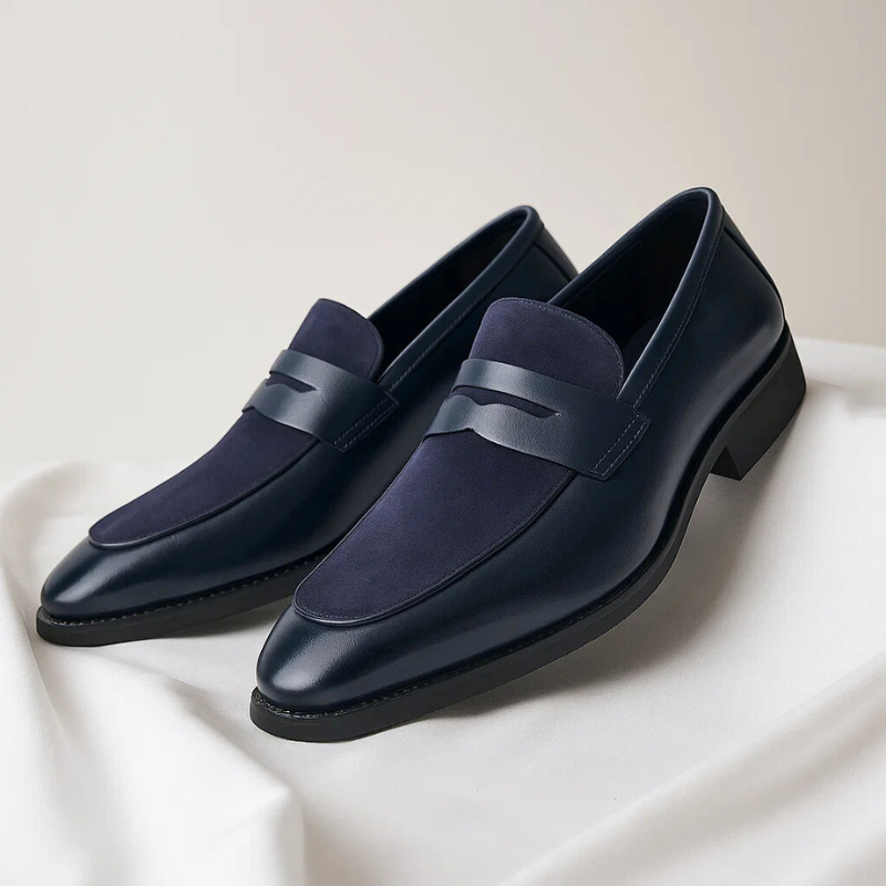 Men's navy and black penny loafers with almond toe and low heel