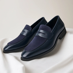 Men's navy and black penny loafers with almond toe and low heel