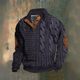 Men's cable knit jumper with high collar, buttons and elbow patches