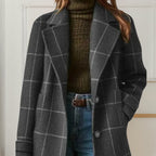Women's long checkered coat with notched lapels and button front