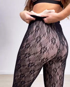 Black women's lace pattern footed leggings