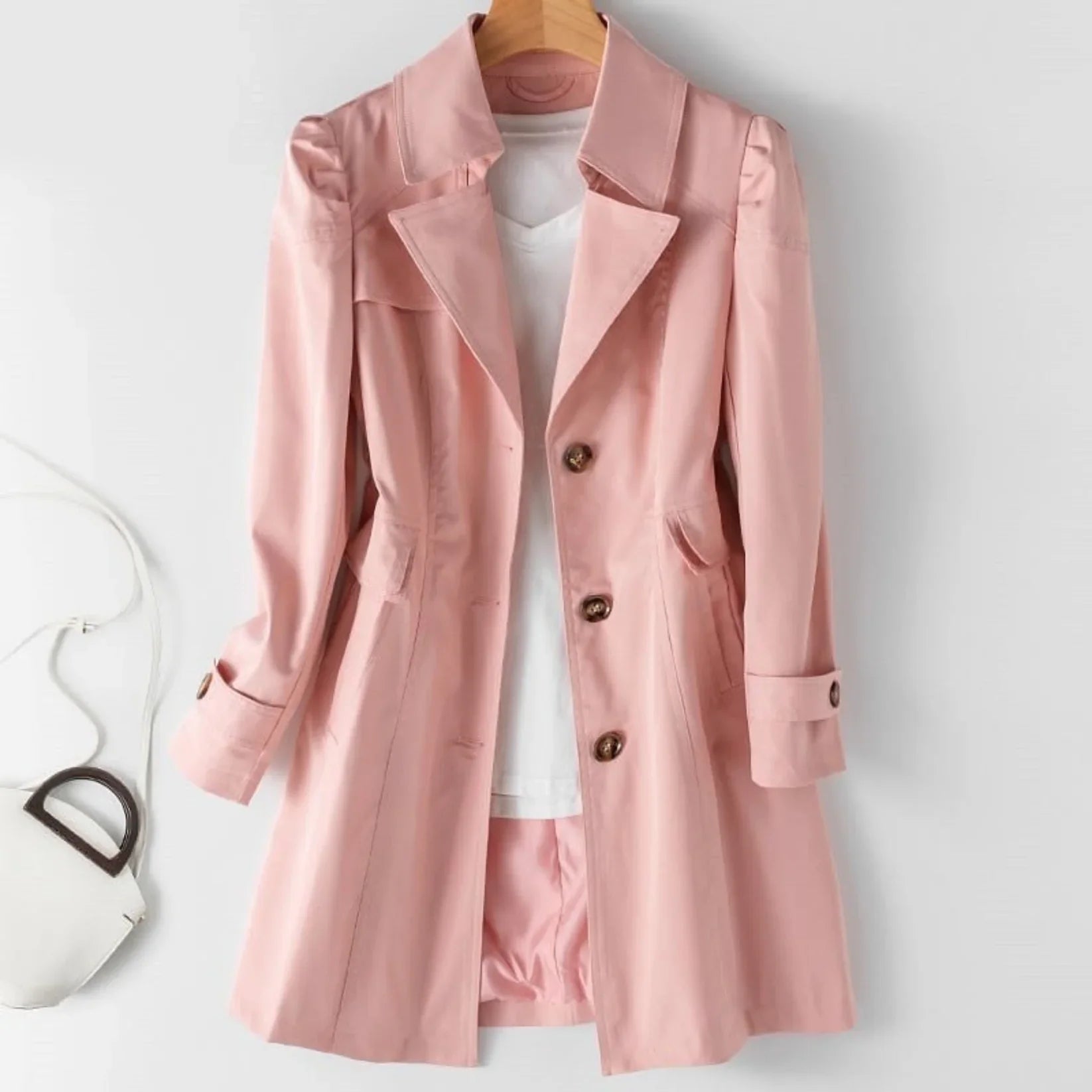 Women's belted trench coat with wide lapels and flap pockets