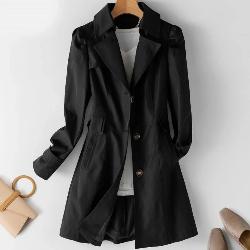 Women's belted trench coat with wide lapels and flap pockets