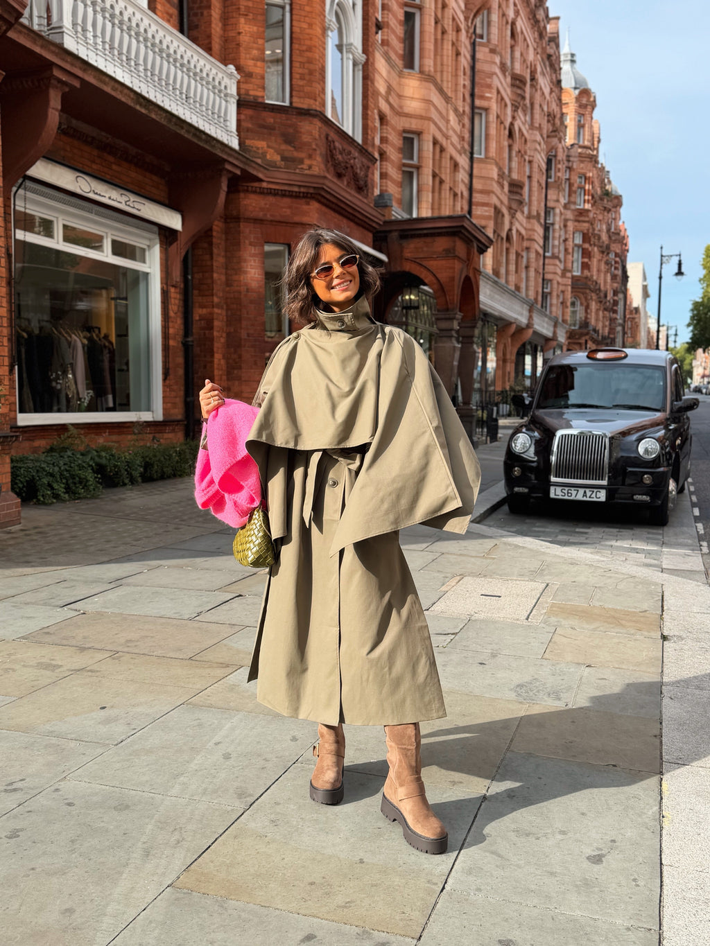 Women's beige belted trench coat with cape overlay and long sleeves