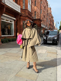 Women's beige belted trench coat with cape overlay and long sleeves