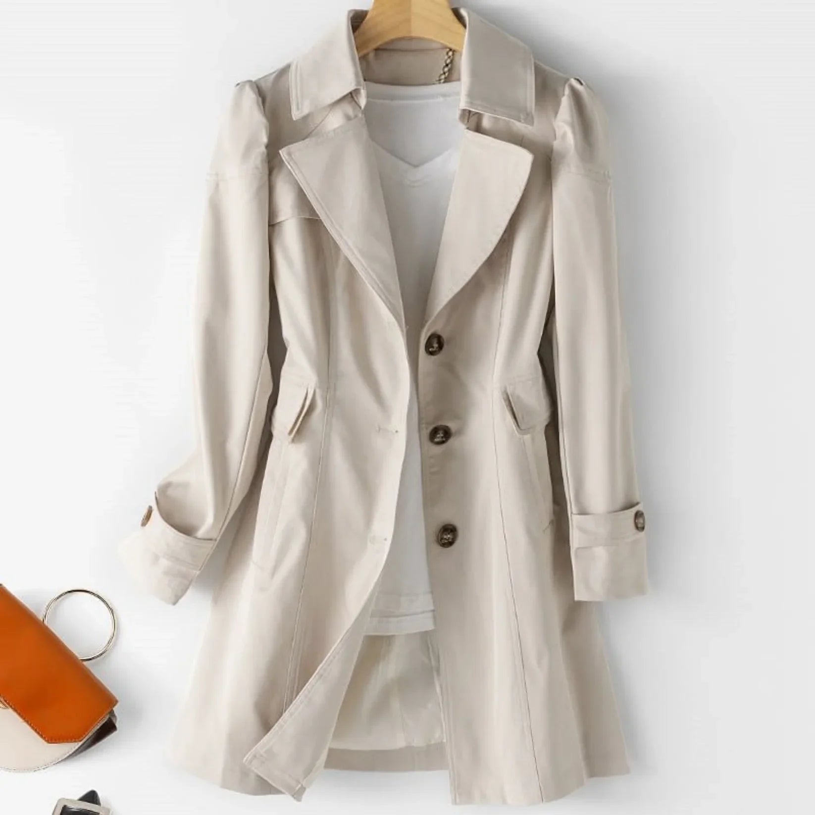 Women's belted trench coat with wide lapels and flap pockets