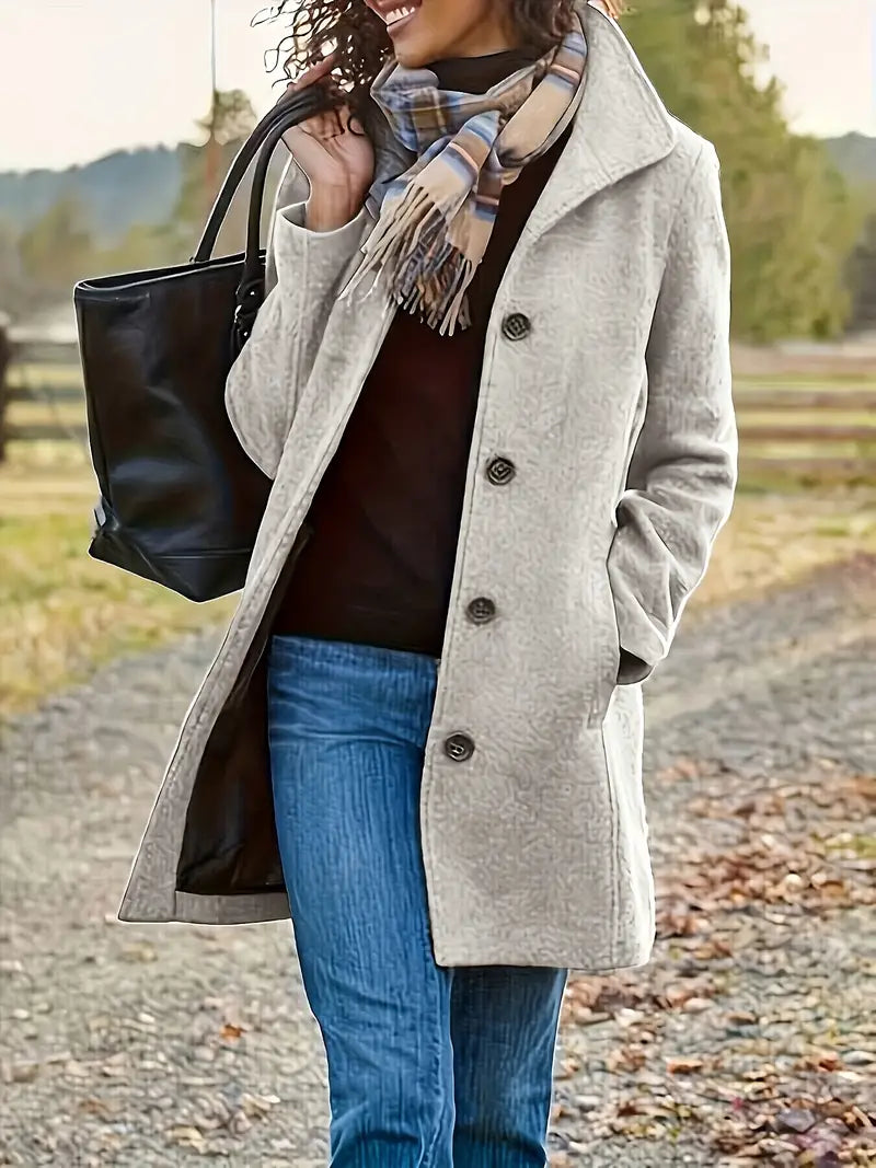 Women's textured mid-length coat with lapel collar and button front