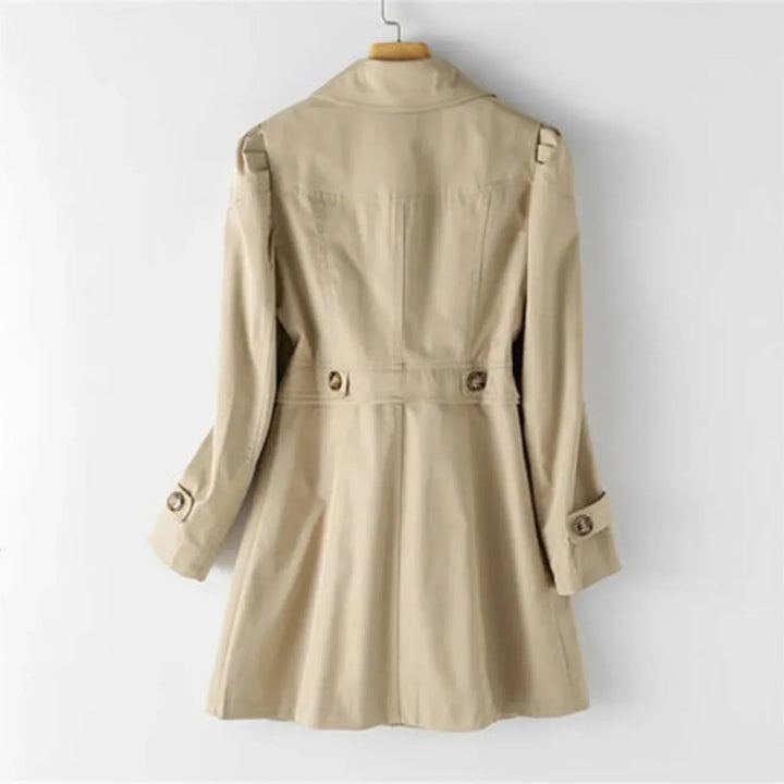 Women's belted trench coat with wide lapels and flap pockets