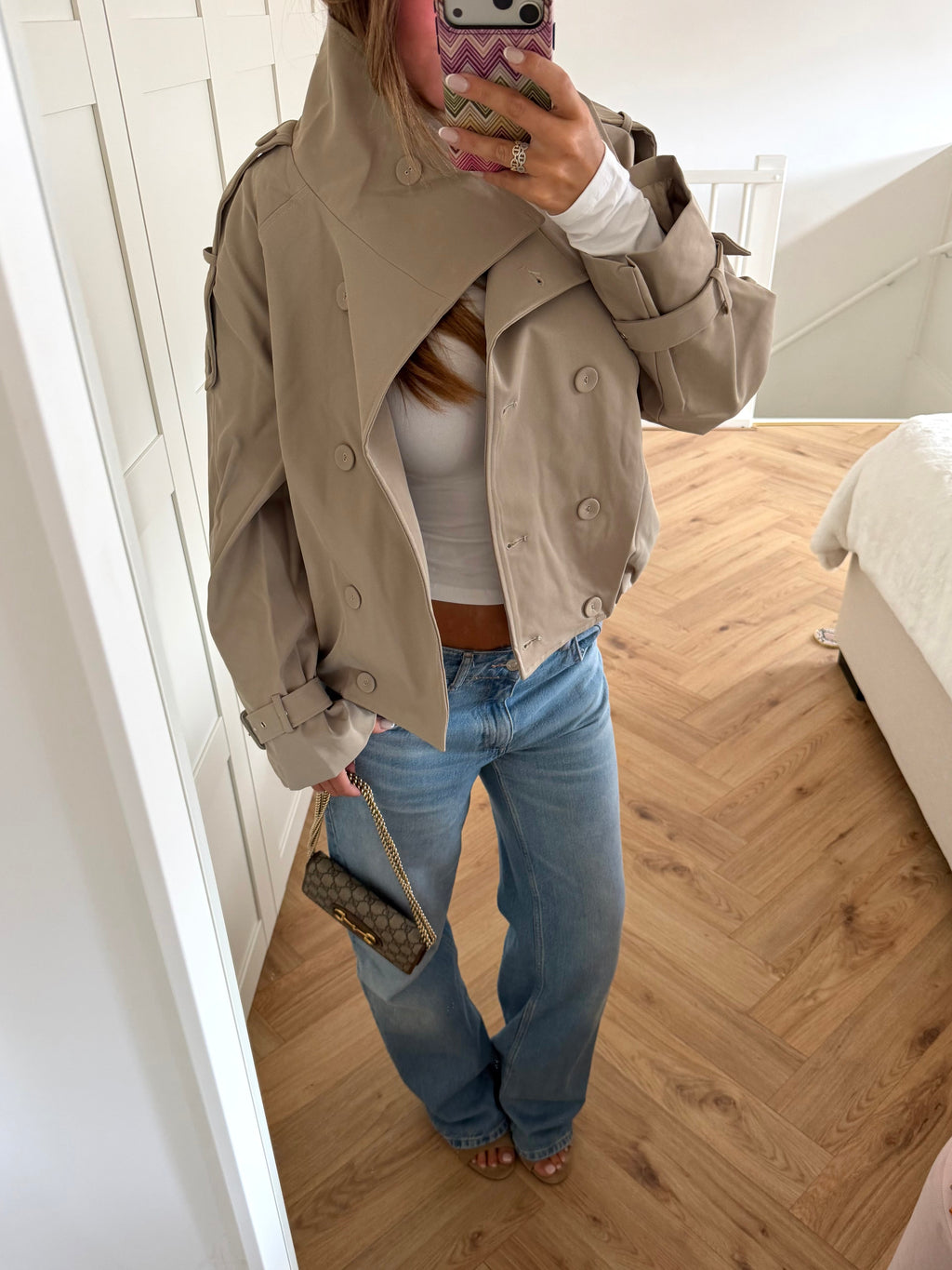 Women's beige cropped double-breasted trench jacket with high collar and belted cuffs