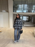 Women's black checked roll neck jumper