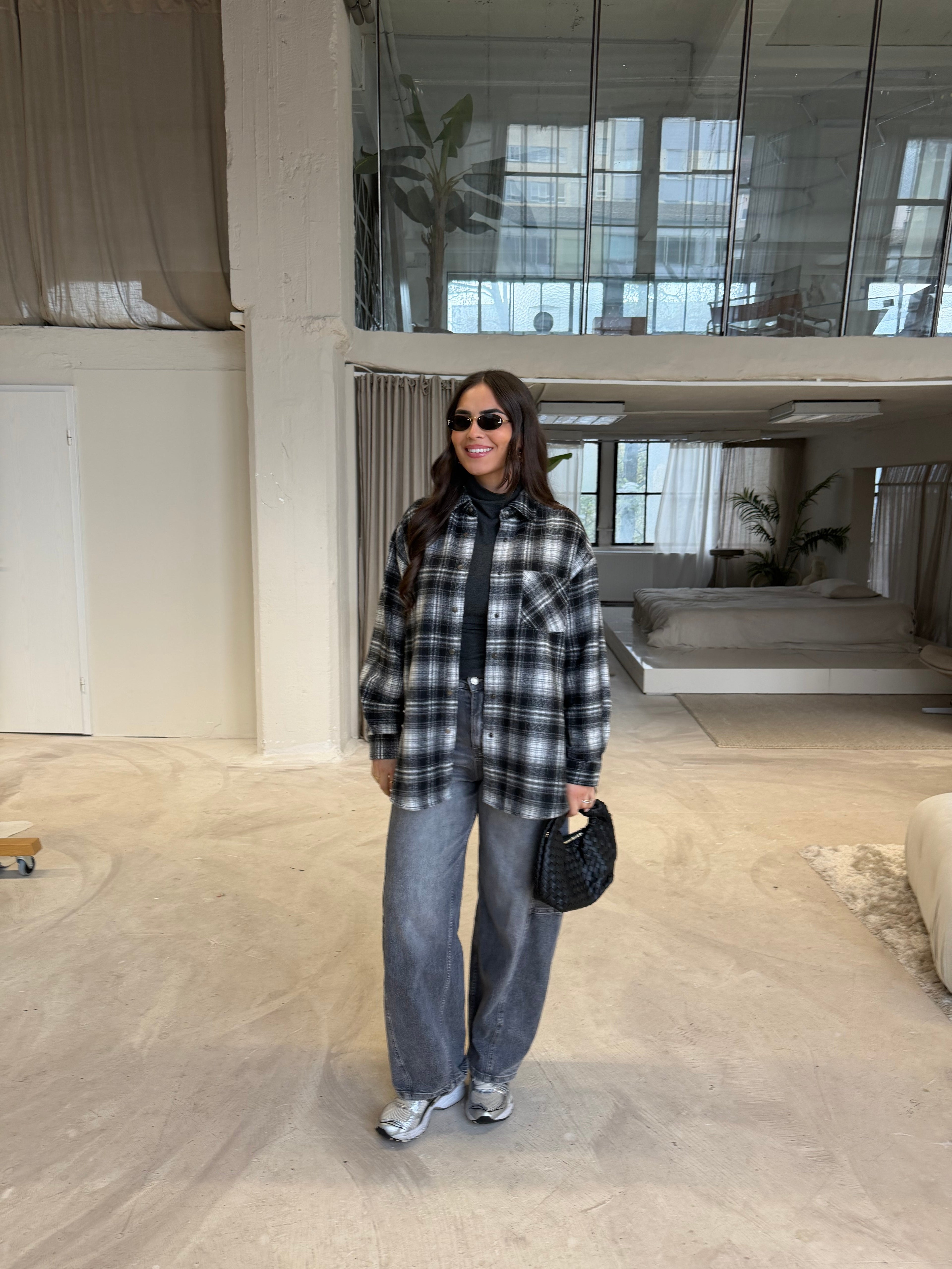 Women's black checked roll neck jumper