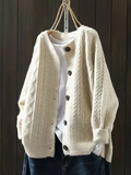 Women's cable-knit cardigan with crew neckline, long sleeves and button front