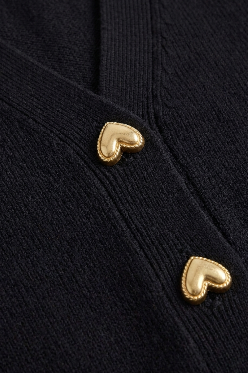 Women's V-neck cardigan with decorative heart-shaped buttons