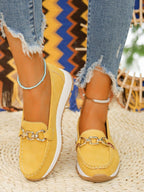 Women's loafers with gold chain detail and thick sole