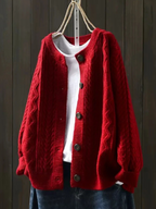 Women's cable-knit cardigan with crew neckline, long sleeves and button front