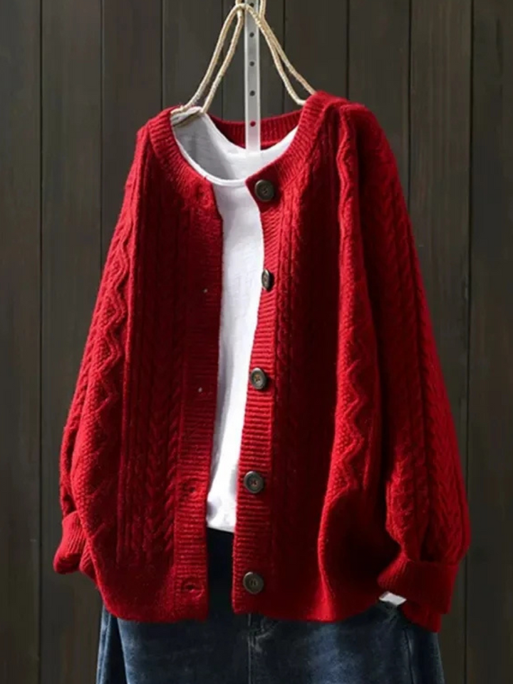 Women's cable-knit cardigan with crew neckline, long sleeves and button front