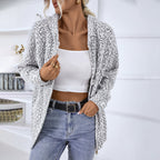 Women's textured hooded knit cardigan with long sleeves and zip front