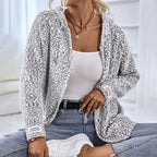 Women's textured hooded knit cardigan with long sleeves and zip front