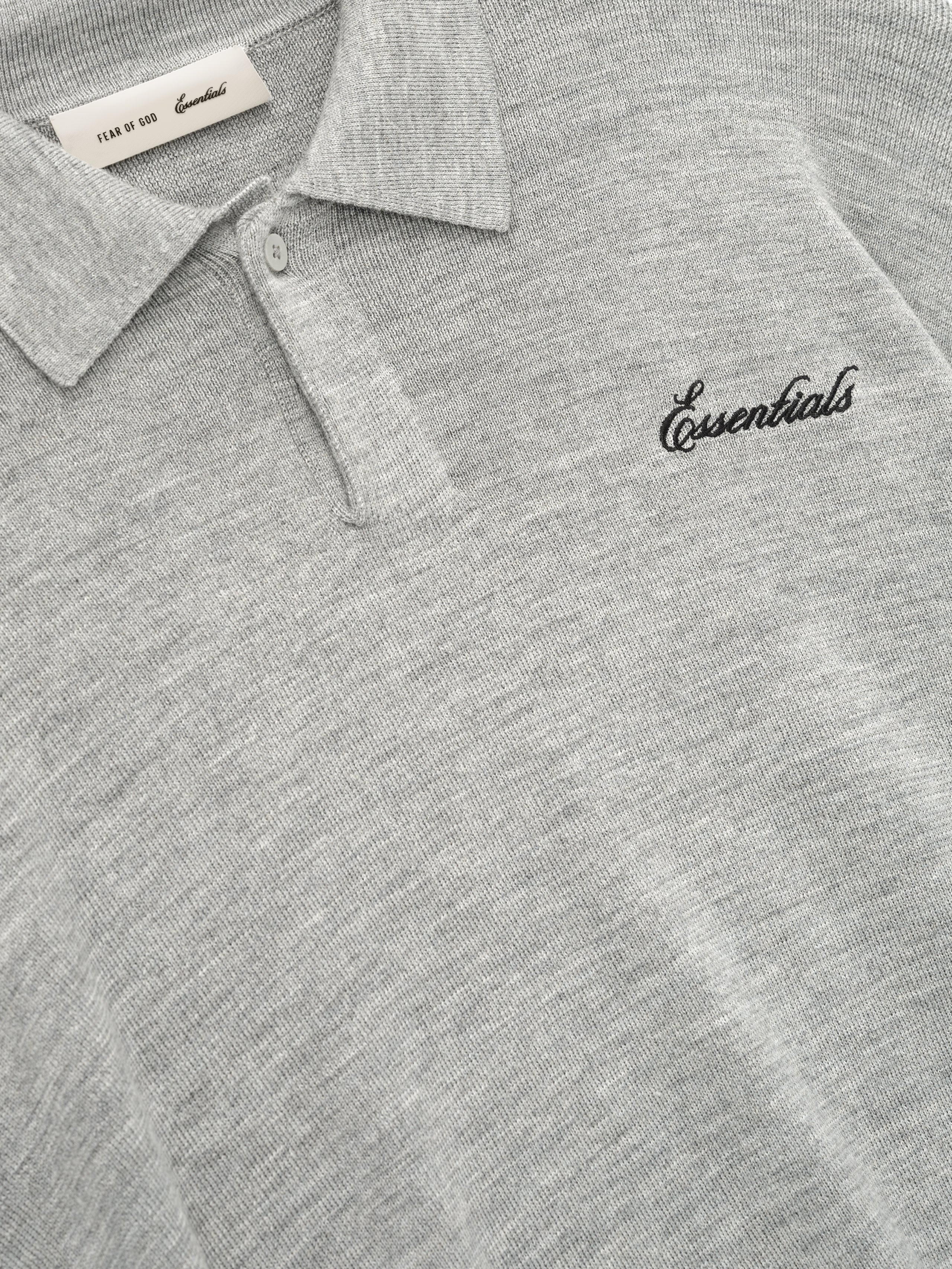 Gray long sleeve knit polo with collar and chest script detail